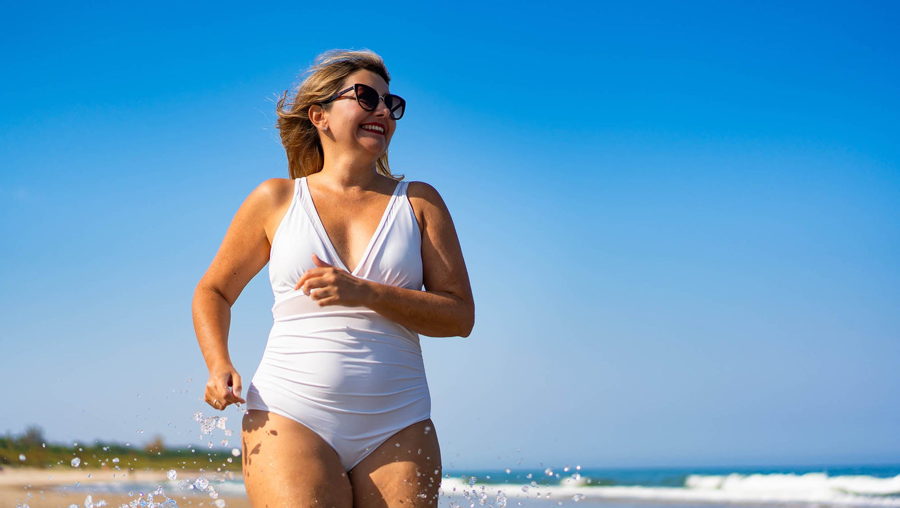 Women Over 50 Love These 17 Tummy-Hiding Swimsuits That 'Cover All the Right Places' — From $8